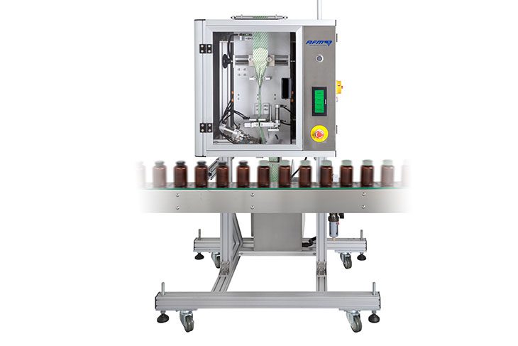CH-100 Tamper Band Applicator Profile in Packaging World